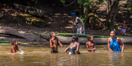 A family playing canal water