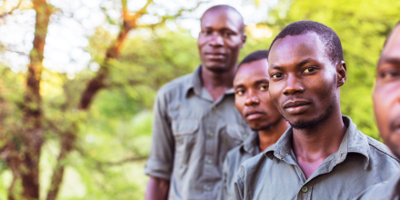 Group of African forest rangers facing the camera for a portrait