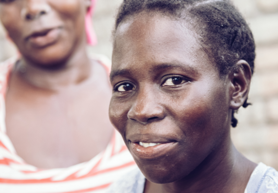 A woman from Malawi looks at the camera