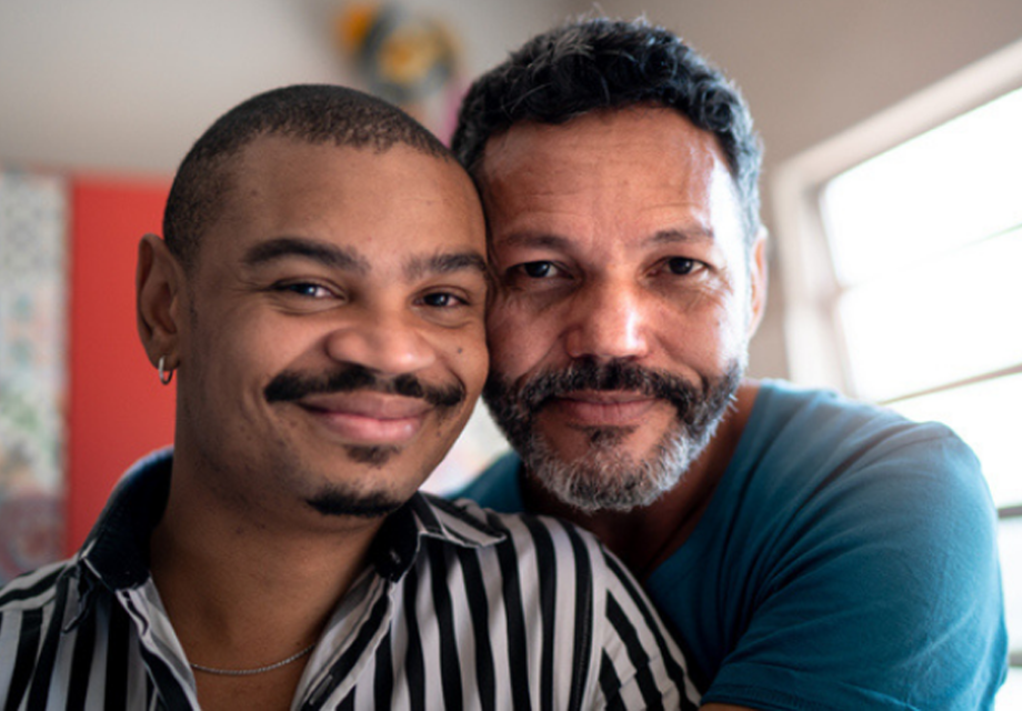Portrait of a homosexual couple at home stock photo