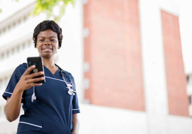 A health worker on her mobile phone
