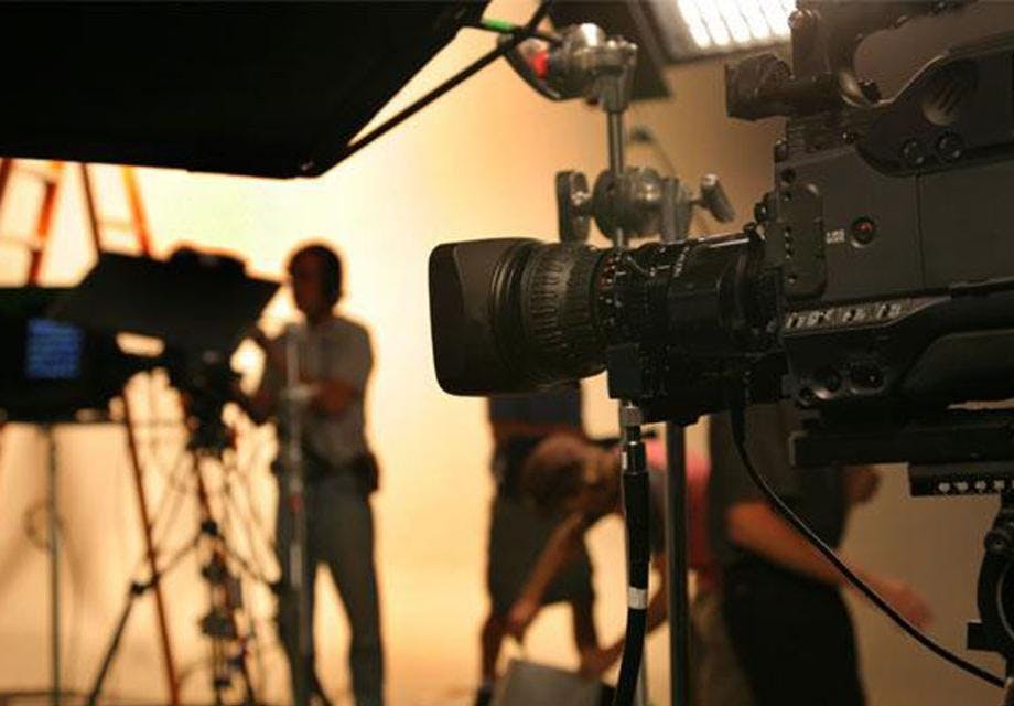 Cameras and lights behind the scenes on a film set